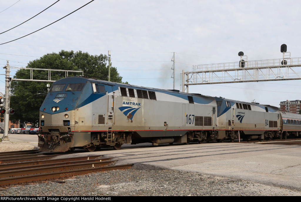 AMTK 167 & 84 lead the Silver Star away from the station